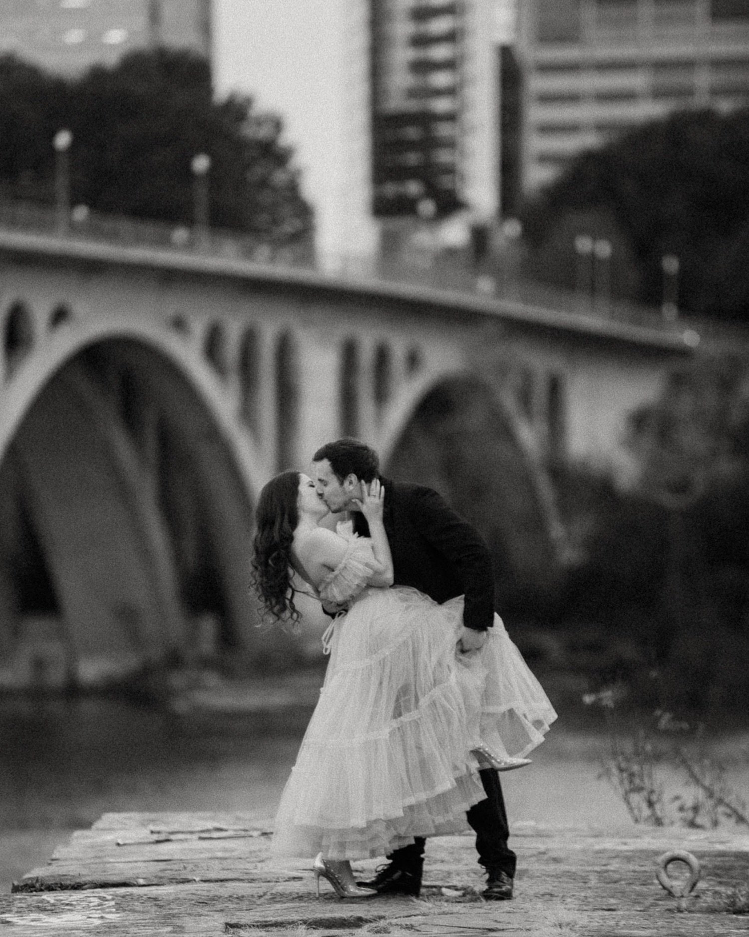 Photo By Pat Cori Photography of a couple posing and celebrating their engagement in Washington DC