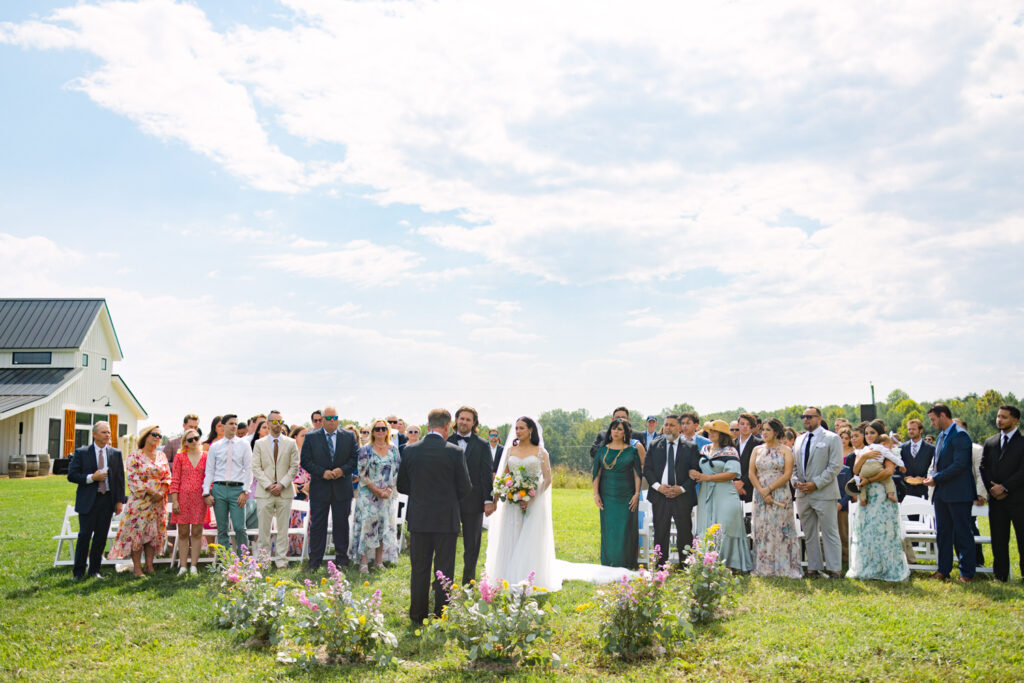 couple during ceremony at blossom ridge farm in charlottesville va