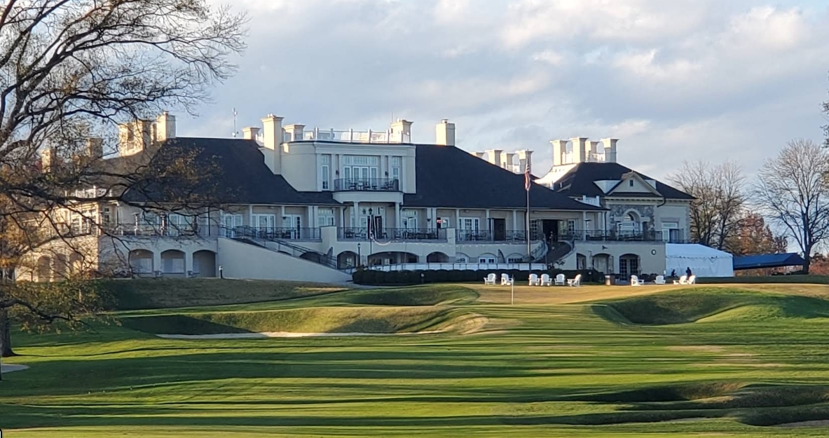Photo of Belle Haven Country Club the back area golf course. A large spanning country club in cream stone. Alexandria Virginia wedding venues.