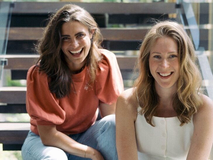 Photo of LK Events VA wedding Planners smiling for photo sitting on steps.