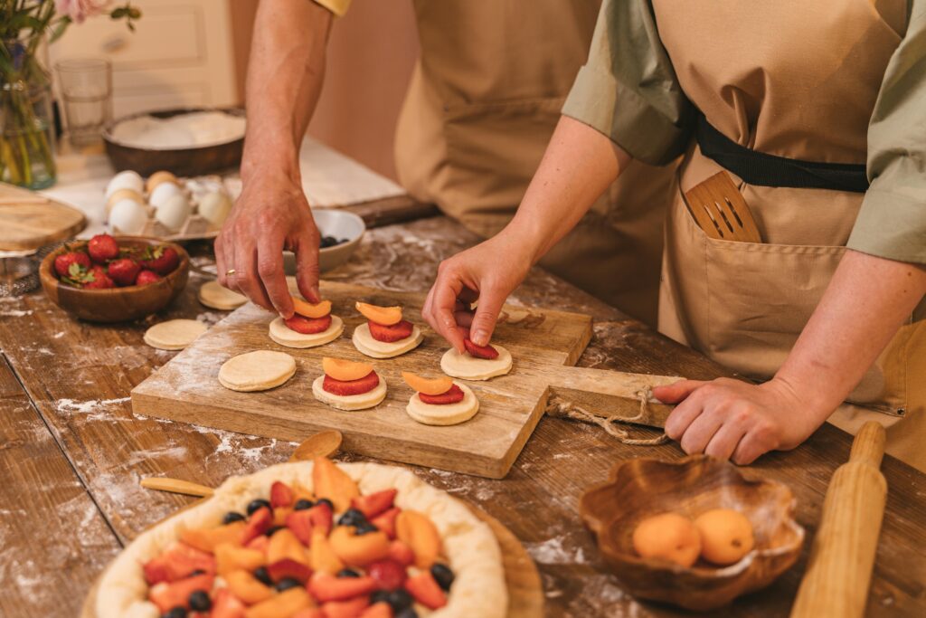 Photo of couples at cooking classes together for date ideas for Washington DC.