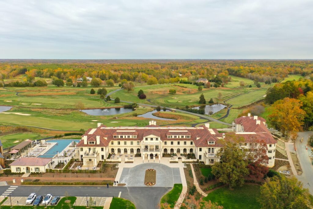 Aerial Photo of Keswick Hall luxury resort that is large estate surrounded by lush greenery. Great wedding places Virginia.