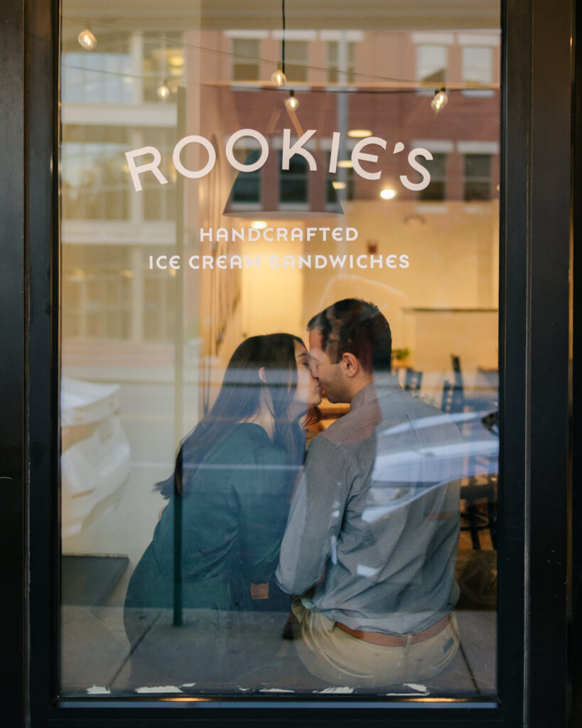 couple kissing inside of rookies in roanoke