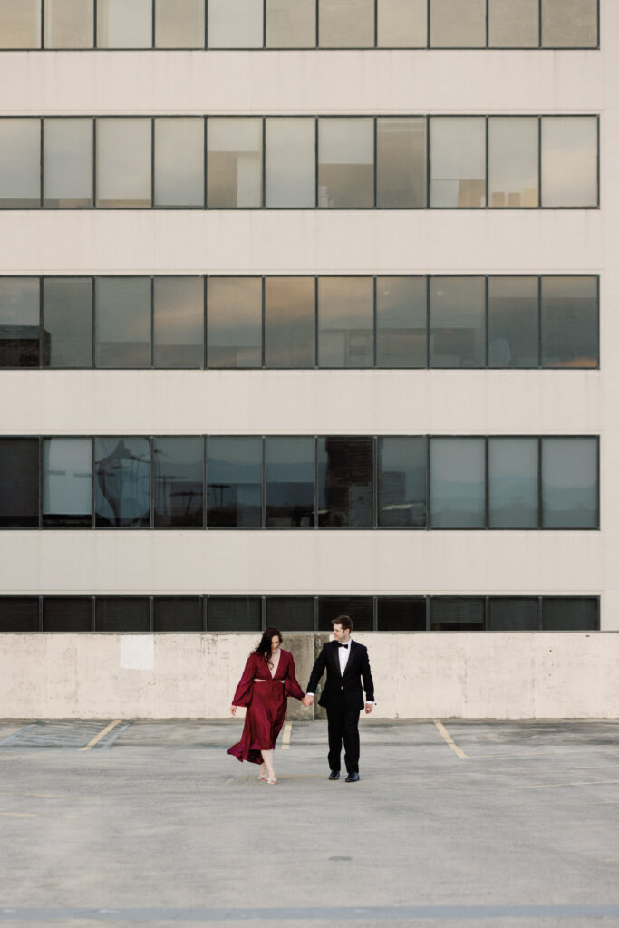 couple at parking garage for engagement photos in roanoke