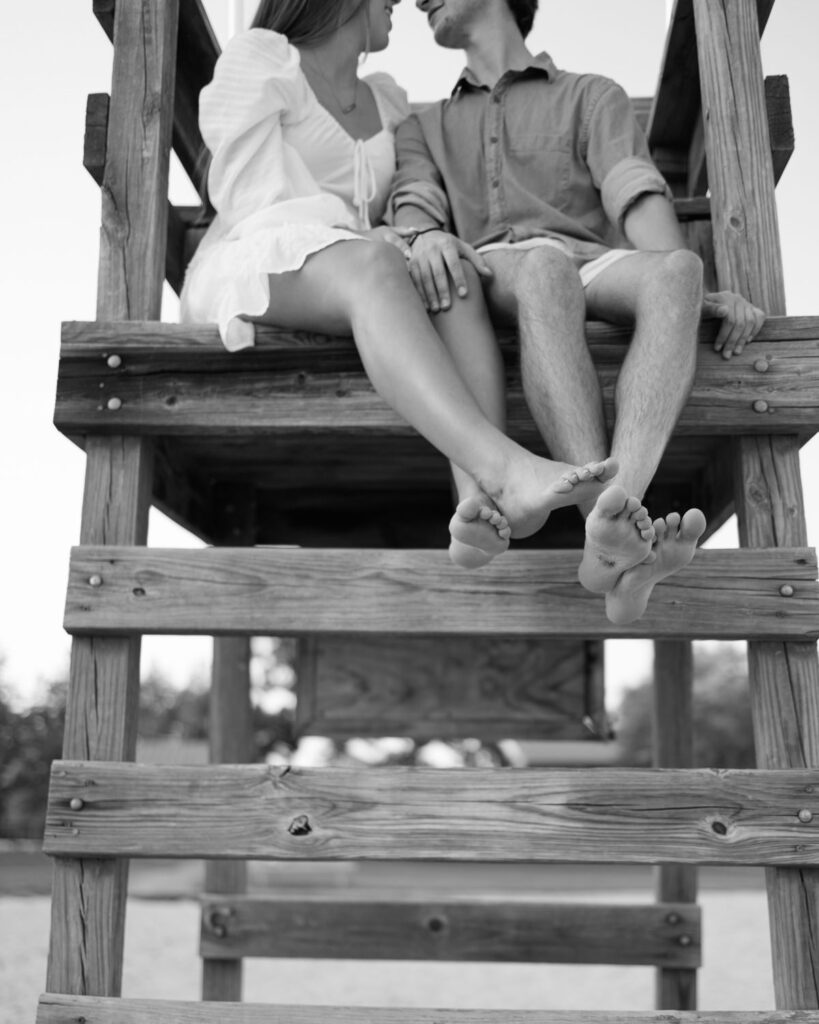 black and white close up of couple's bare feet