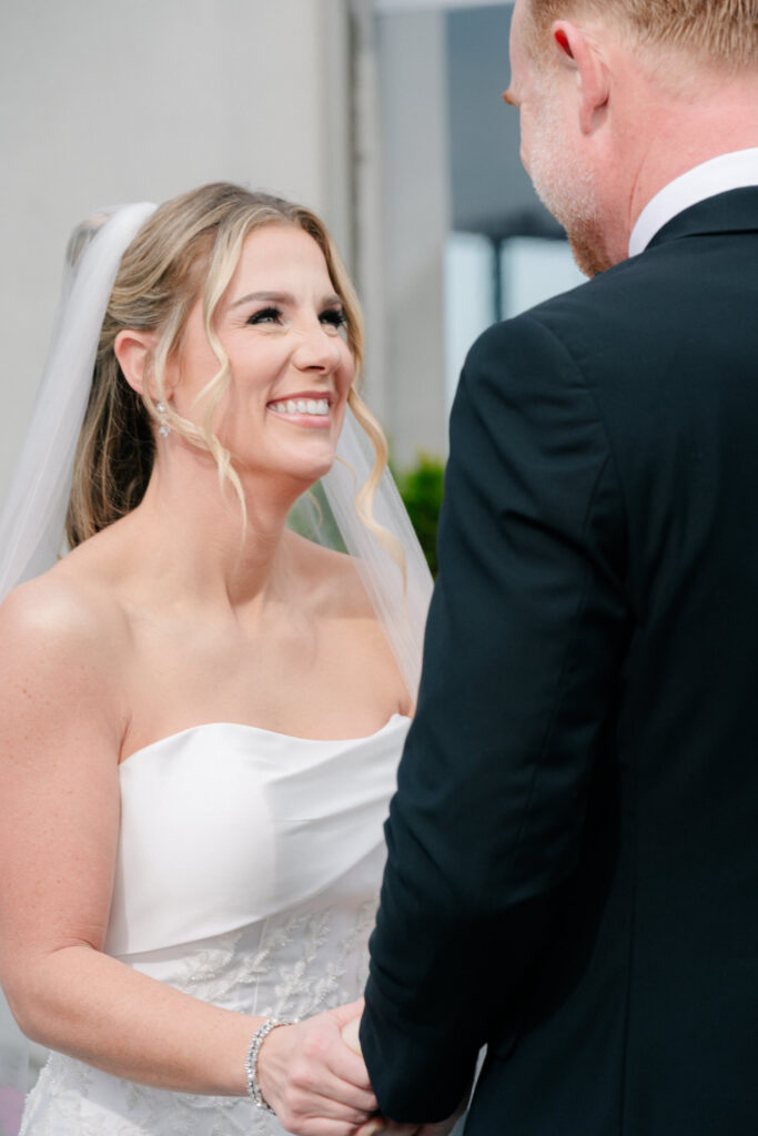 bride's reaction during an intimate first look at The Virginian Hotel wedding in Lynchburg, VA