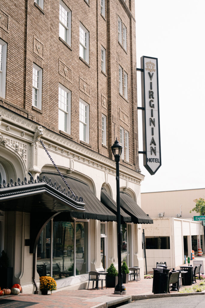 Photo of the front entrance and the sign of the virginian hotel in lynchburg va