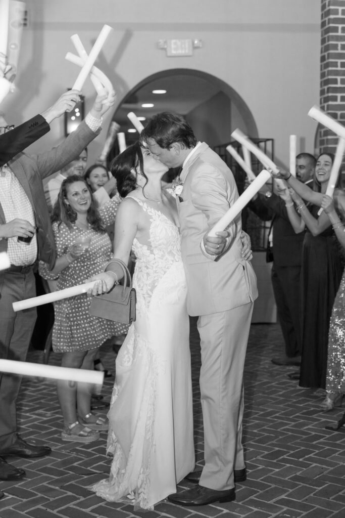 Bride and Groom share a kiss during their glow stick wedding exit at The Alexandrian Hotel in Alexandria, Virginia